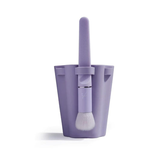 Quivy Brush Drying & Storage Cup in purple with a makeup brush, designed for upright drying and neat storage.