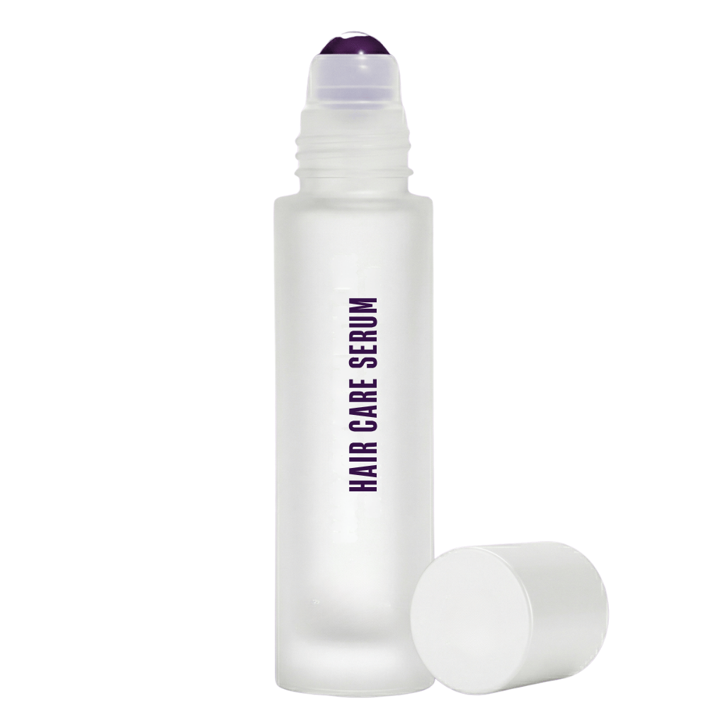 Hair Care Serum in a transparent bottle with a roll-on applicator for shiny, fuller-looking hair.