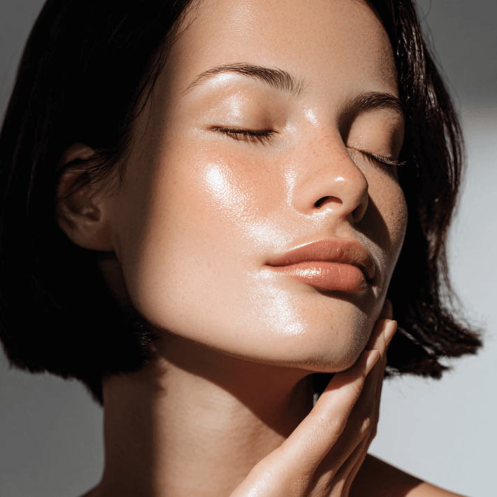 Close-up of a woman with radiant skin using Japanese Nano Refreshing Liquid for a polished, fresh look.