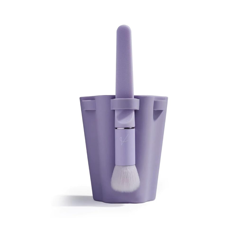 Quivy Brush Drying & Storage Cup in purple with a makeup brush, designed for upright drying and neat storage.