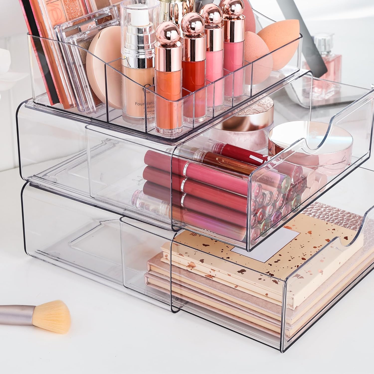 Quivy ClearStack sleek 3-tier makeup organizer with lipsticks, brushes, and skincare essentials in transparent design.